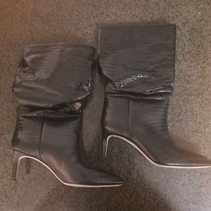 One pair of black paris texas boots